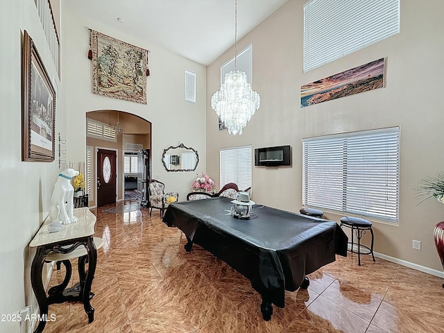 1350 E Racine Dr, Casa Grande, AZ 85122 - game room with arched walkways, visible vents, a high ceiling, baseboards, and a notable chandelier