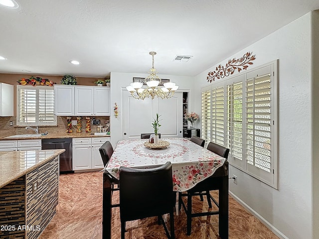 1350 E Racine Dr, Casa Grande, AZ 85122 - dining room featuring recessed lighting, visible vents, baseboards, and an inviting chandelier