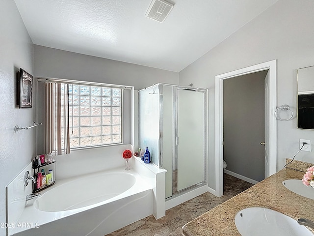 1350 E Racine Dr, Casa Grande, AZ 85122 - bathroom with visible vents, a bath, a sink, toilet, and a shower stall