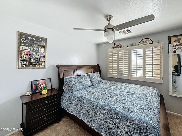 1350 E Racine Dr, Casa Grande, AZ 85122 - bedroom featuring visible vents, ceiling fan, a textured ceiling, and carpet floors