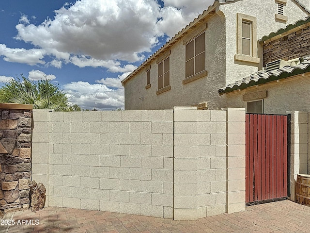 1350 E Racine Dr, Casa Grande, AZ 85122 - exterior space featuring stucco siding, fence, and a tile roof