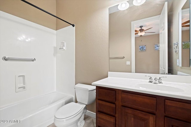 full bathroom featuring vanity, tile patterned floors, washtub / shower combination, ceiling fan, and toilet