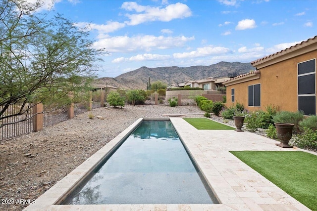 view of pool with a mountain view