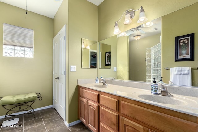 bathroom with vanity and tile patterned flooring