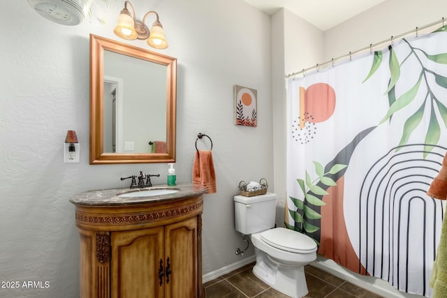 bathroom featuring tile patterned flooring, vanity, toilet, and a shower with shower curtain