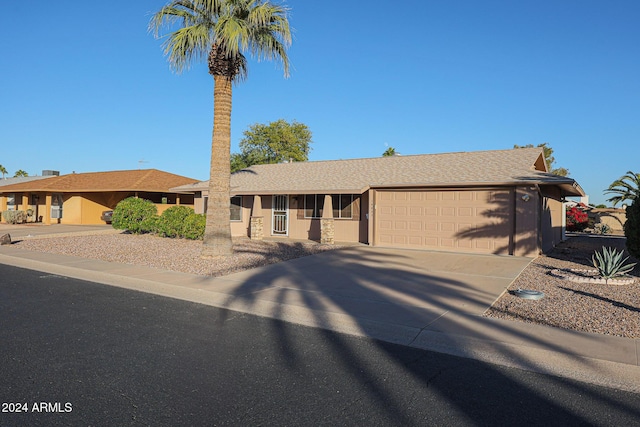 ranch-style house with a garage