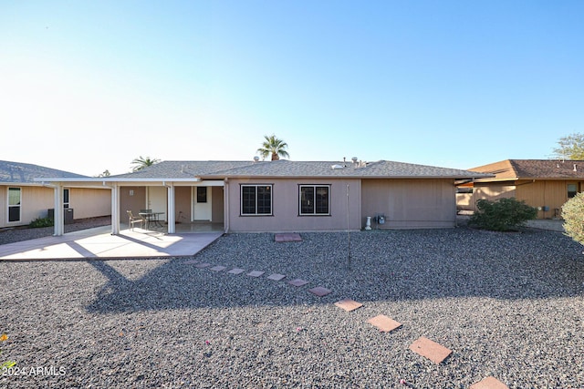 single story home featuring a patio