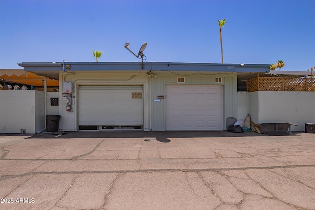 garage featuring fence