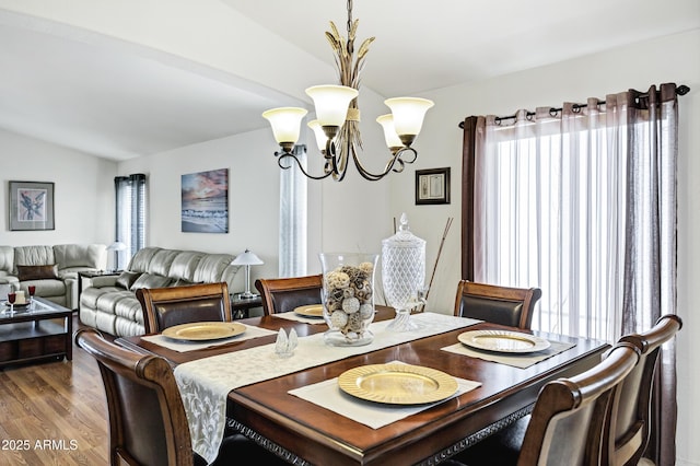 23862 W Chambers St, Buckeye, AZ 85326 - dining room featuring a chandelier, wood finished floors, and lofted ceiling