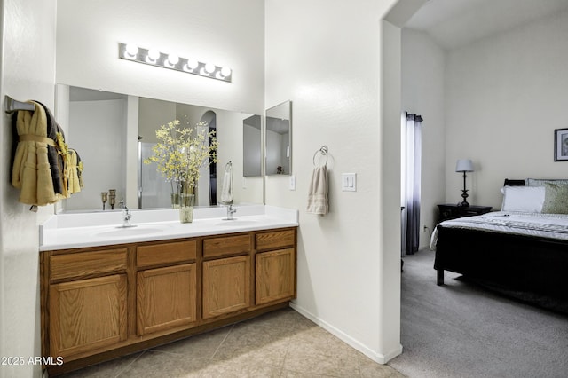 23862 W Chambers St, Buckeye, AZ 85326 - full bathroom with double vanity, baseboards, and tile patterned floors