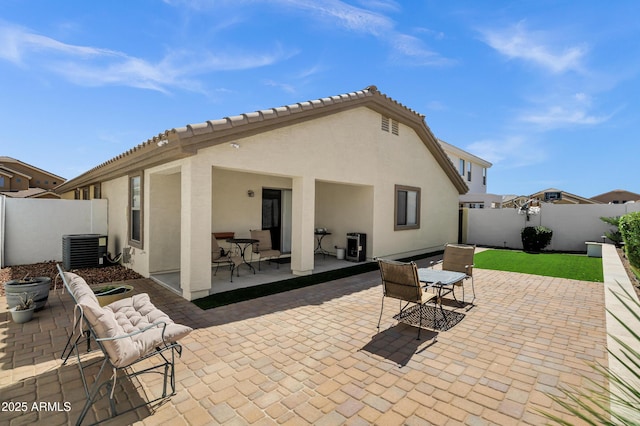 23862 W Chambers St, Buckeye, AZ 85326 - view of patio / terrace featuring a fenced backyard, central AC, and outdoor dining area