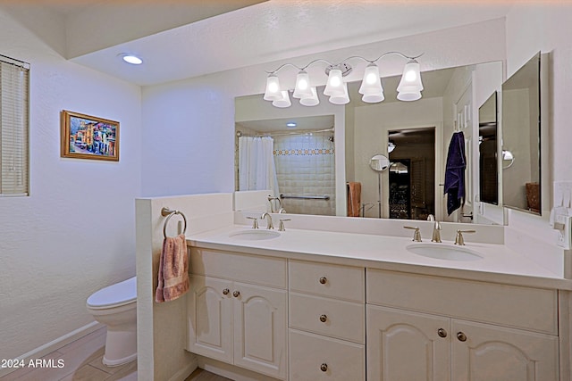 bathroom with toilet, a shower with curtain, vanity, and tile patterned flooring