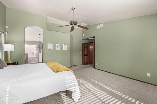 bedroom with ceiling fan and light carpet