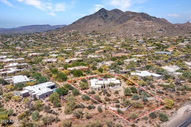 drone / aerial view featuring a mountain view