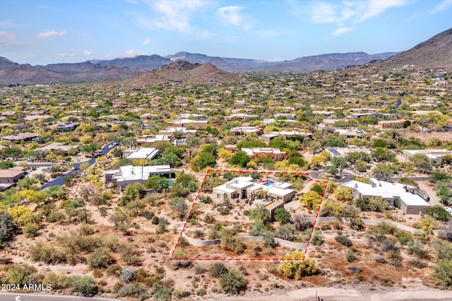 drone / aerial view featuring a mountain view