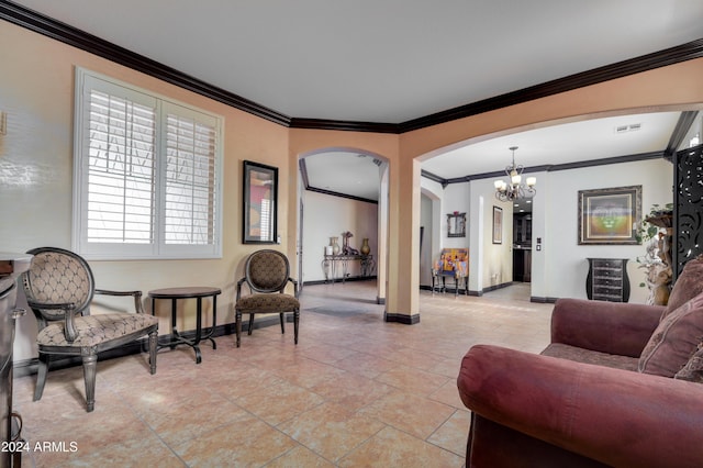 living room featuring ornamental molding and an inviting chandelier