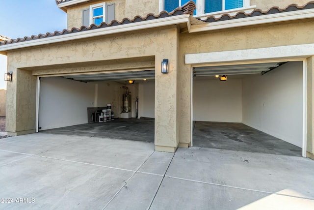 garage featuring gas water heater