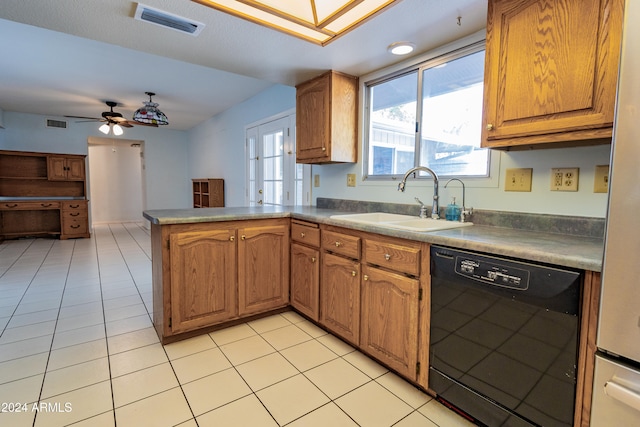 kitchen with dishwasher, sink, ceiling fan, light tile patterned floors, and kitchen peninsula