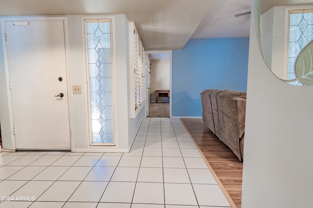 view of tiled foyer entrance