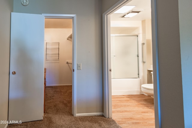 corridor featuring hardwood / wood-style flooring