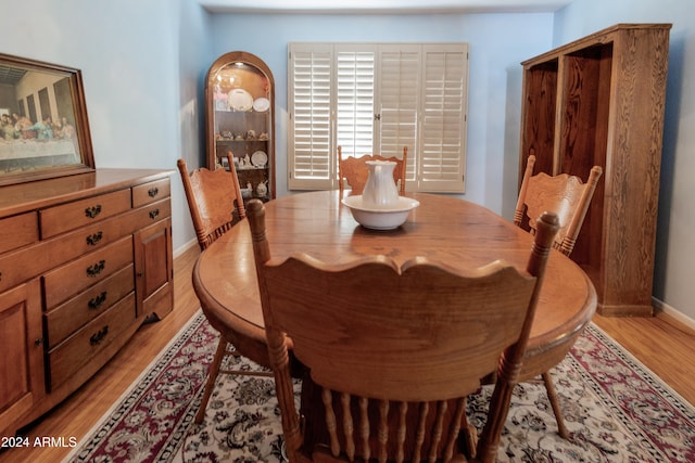 dining space featuring light hardwood / wood-style floors