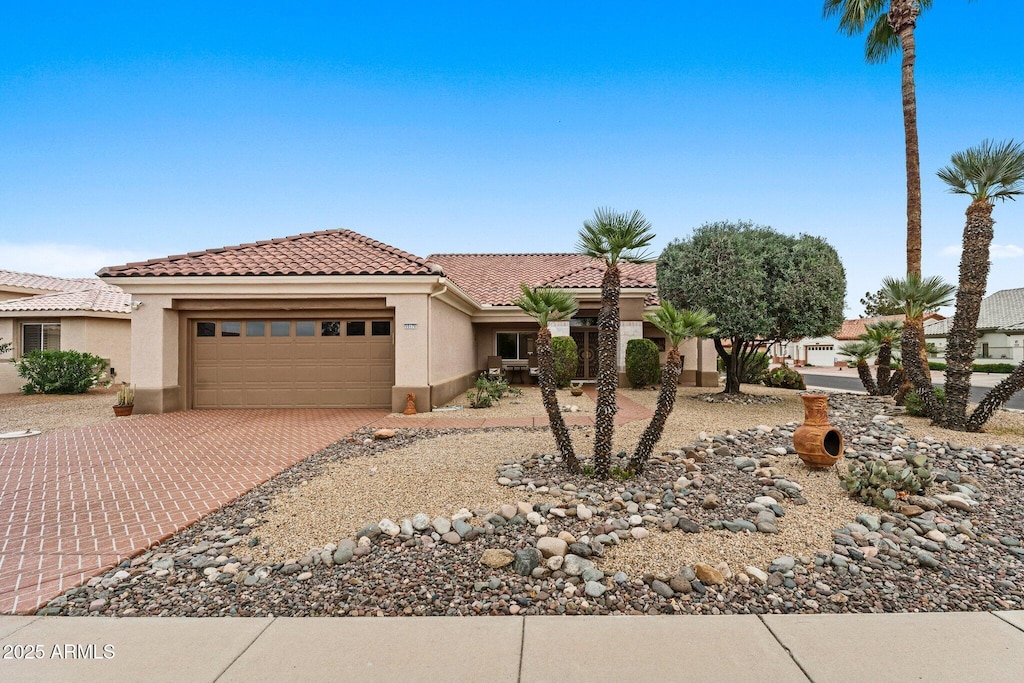 view of front of home with a garage