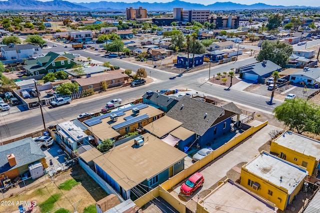 birds eye view of property featuring a mountain view