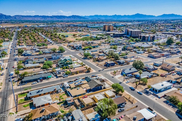 drone / aerial view featuring a mountain view