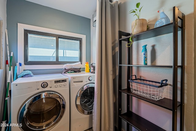 laundry area featuring washer and clothes dryer