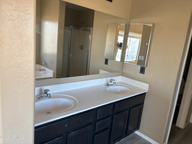 29101 N Yellow Bee Dr, San Tan Valley, AZ 85143 - bathroom featuring a shower stall, double vanity, and a garden tub