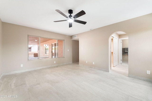 empty room featuring ceiling fan