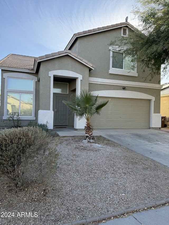 view of front of home with a garage