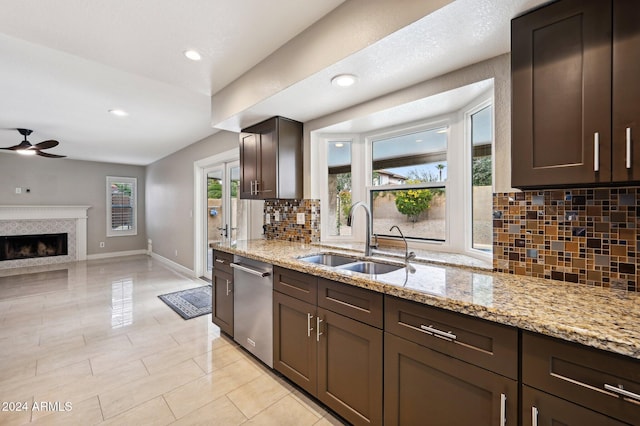5544 E Paradise Ln, Scottsdale, AZ 85254 - kitchen featuring dishwasher, ceiling fan, decorative backsplash, dark brown cabinetry, and recessed lighting
