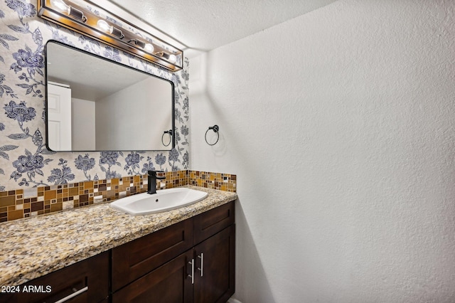 5544 E Paradise Ln, Scottsdale, AZ 85254 - bathroom with decorative backsplash and vanity