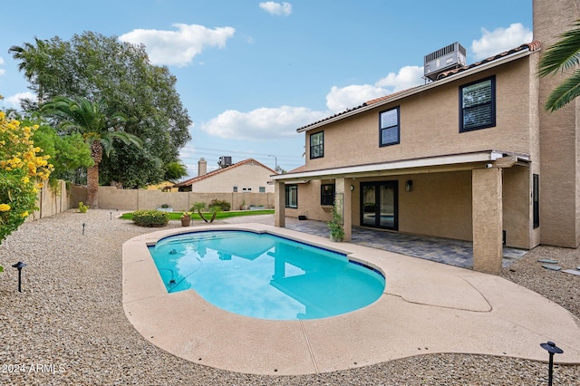 5544 E Paradise Ln, Scottsdale, AZ 85254 - view of swimming pool featuring french doors, a fenced backyard, and a patio