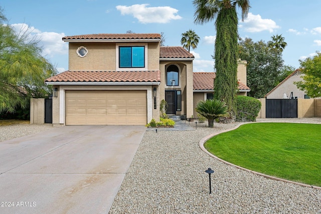 5544 E Paradise Ln, Scottsdale, AZ 85254 - mediterranean / spanish home with a garage, driveway, stucco siding, and a tile roof