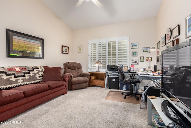 office featuring carpet floors, ceiling fan, and vaulted ceiling