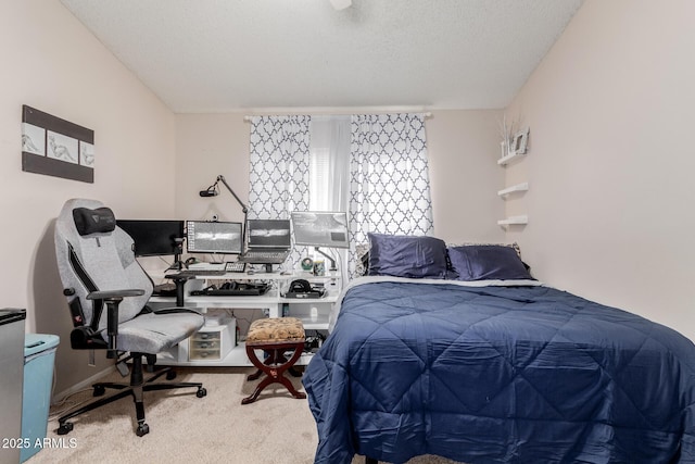 carpeted bedroom with a textured ceiling