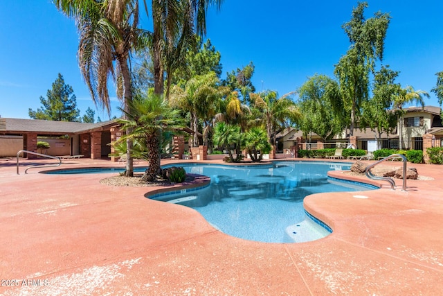 view of pool with a patio area