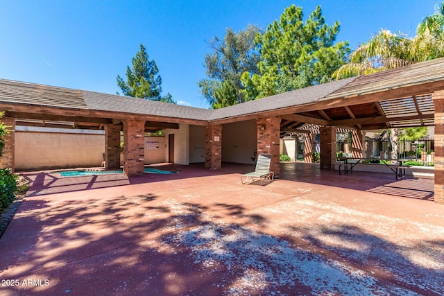 view of front of property with a patio area