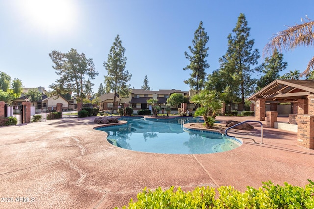 view of pool featuring a gazebo and a patio area