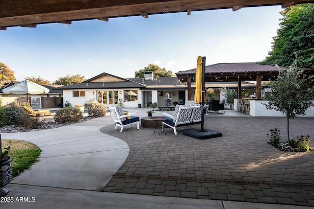 view of patio featuring exterior bar