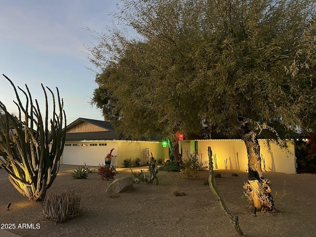 view of front of property featuring a garage