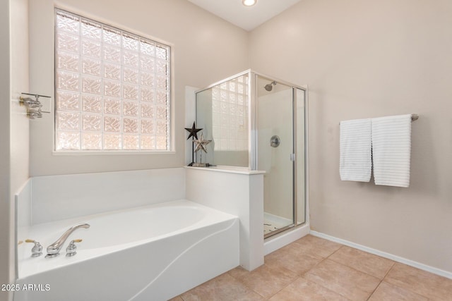 full bathroom with a garden tub, tile patterned flooring, baseboards, recessed lighting, and a stall shower