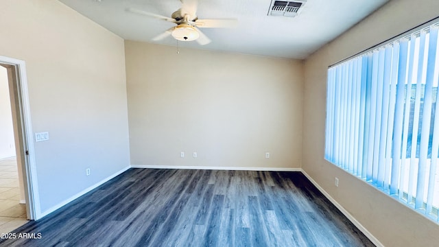 1630 W Pecan Rd, Phoenix, AZ 85041 - unfurnished room featuring a ceiling fan and wood finished floors