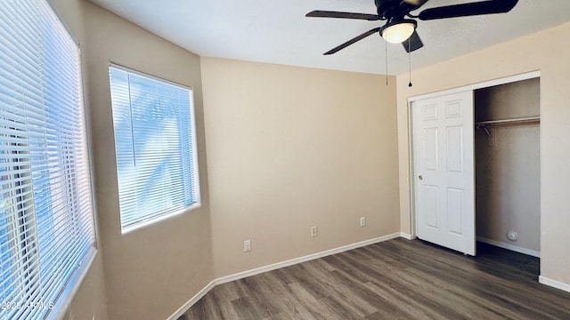 1630 W Pecan Rd, Phoenix, AZ 85041 - unfurnished bedroom with dark wood-style floors, a closet, and ceiling fan