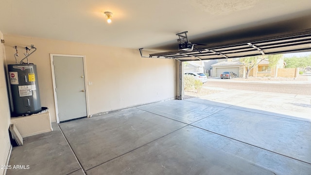 1630 W Pecan Rd, Phoenix, AZ 85041 - garage with water heater and a garage door opener