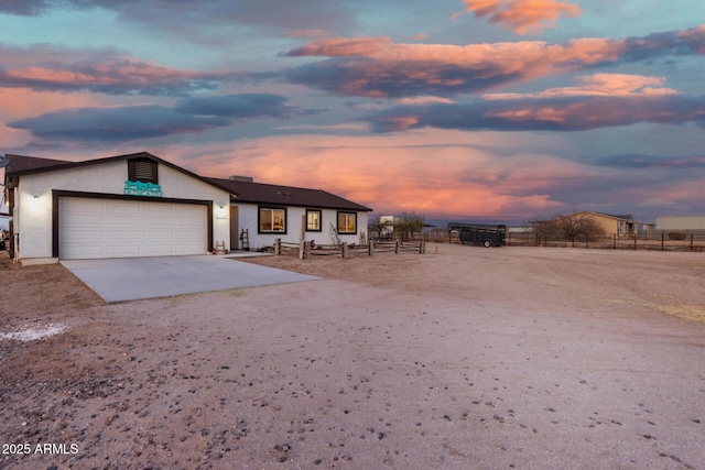 view of front of home featuring a garage