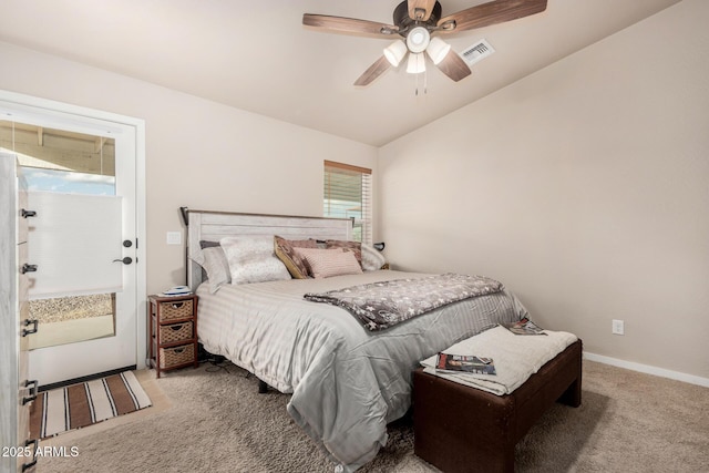 bedroom featuring ceiling fan, multiple windows, lofted ceiling, and carpet