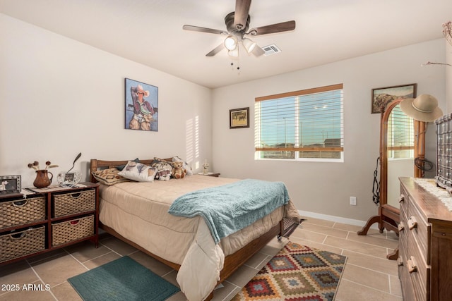 bedroom featuring ceiling fan and light tile patterned floors